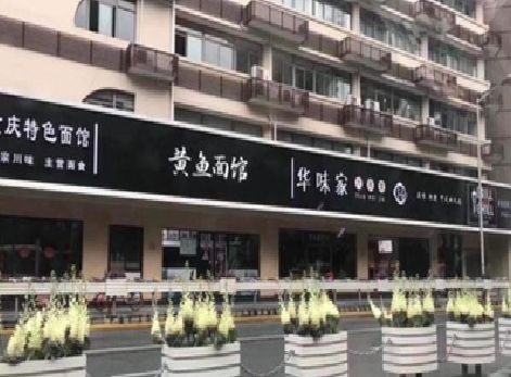 洞口政府为什么要统一规划店铺招牌？
